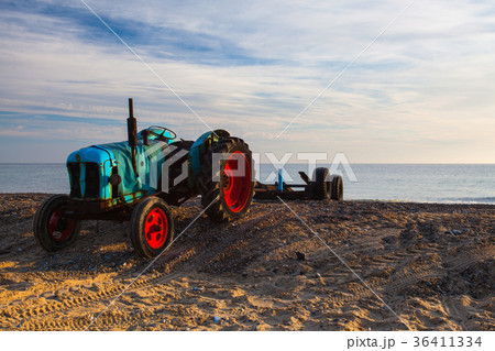 Old rusty tractor on the empty Cromer beach 36411334