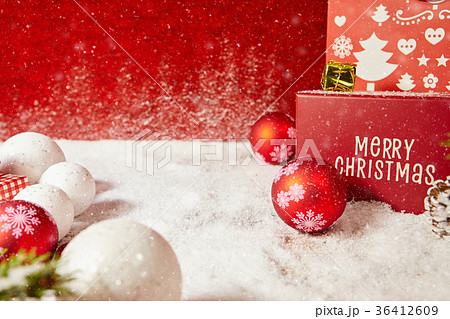 Christmas background with baubles in snow  36412609