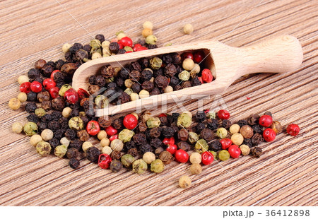 Fresh colored pepper with spoon Fresh colored pepper with spoon 36412898