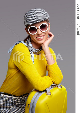 Glamour woman with yellow  suitcase, travel concept 36413322