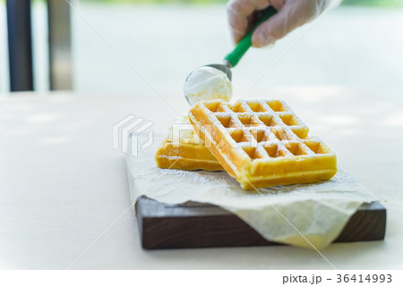 Ice cream added to belgian waffles Ice cream added to belgian waffles 36414993