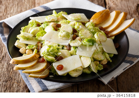 salad of fresh Brussels sprouts with nuts, cheese 36415818