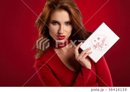Woman with christmas box gift Woman with christmas box gift 36416139