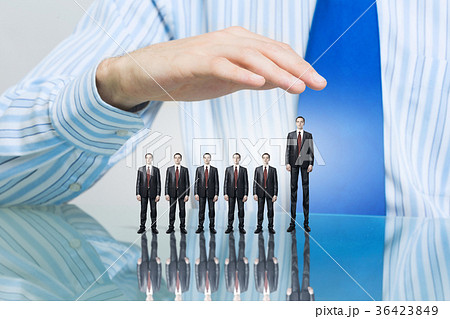 Business people covered with palm Business people covered with palm 36423849