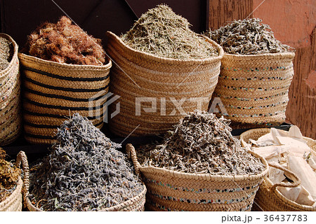 Baskets with dried herbs on the street 36437783
