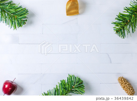 Christmas decoration on white brick Christmas decoration on white brick 36439842