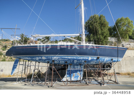 old blue sailing boat in dry dock old blue sailing boat in dry dock 36448958