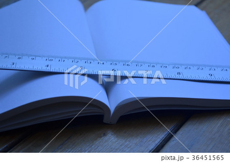 Notebook on the table. 36451565