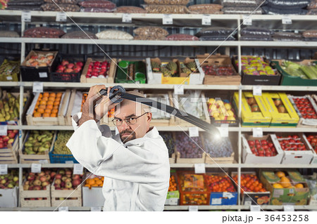 A man against the background with racks with 36453258