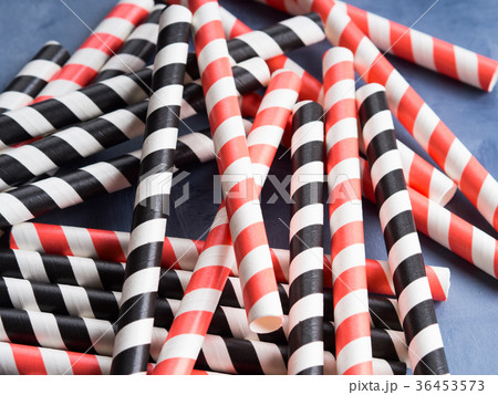 Red and black striped straws background Red and black striped straws background 36453573