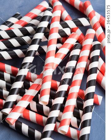 Red and black striped straws background Red and black striped straws background 36453575