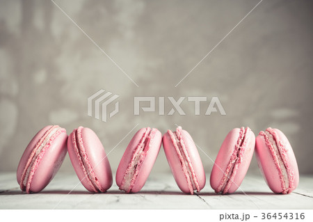 Row of Raspberry pastel pink Macarons or Macaroons 36454316