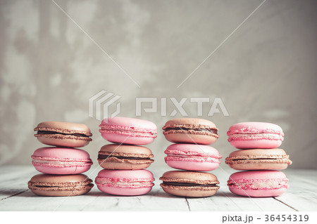 Stack of Raspberry and Chocolate colored Macarons 36454319