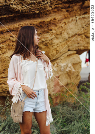 Young stylish girl wearing shorts and jacket Young stylish girl wearing shorts and jacket 36455602