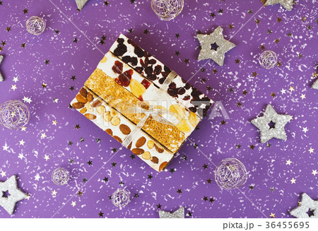 Traditional italian festive torrone or nougat. 36455695