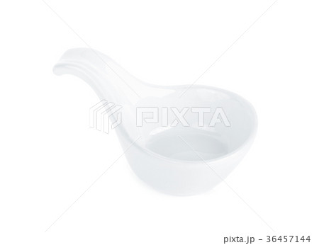 white ceramic spoon on white background 36457144