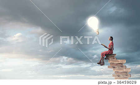 Woman in dress with book 36459029