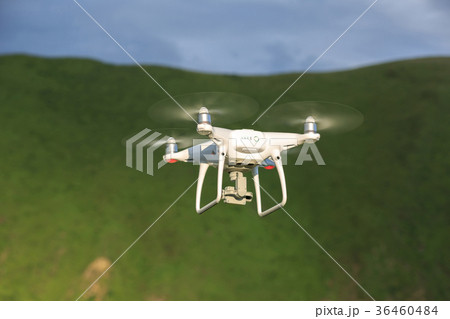 drone with the camera flying in the sky drone with the camera flying in the sky 36460484