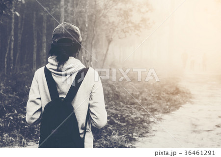hiker women enjoying the beautiful nature with fog hiker women enjoying the beautiful nature with fog 36461291