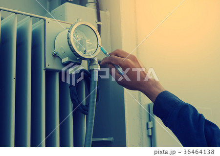electrician checking and inspect equipment electrician checking and inspect equipment 36464138