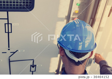 electrician checking and inspect equipment electrician checking and inspect equipment 36464152