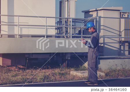 electrician checking and inspect equipment electrician checking and inspect equipment 36464160