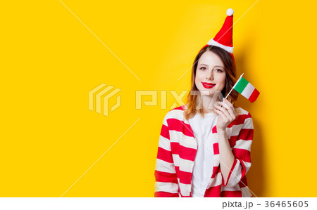 woman in Santa Claus hat with Italy flag woman in Santa Claus hat with Italy flag 36465605