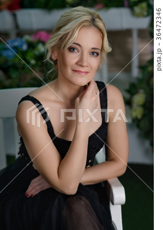 Woman in the flower garden 36472346