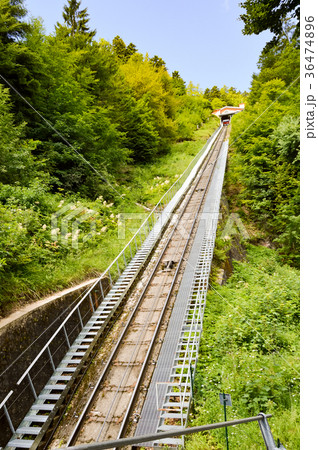 View of the rails of a funicular in the mountains View of the rails of a funicular in the mountains 36474896