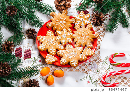 Christmas gingerbread cookies homemade on red  36475447