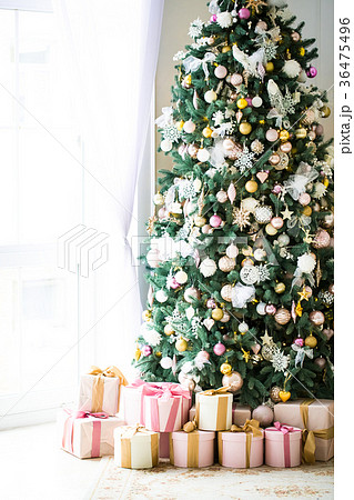 Christmas living room with a Christmas tree, gifts 36475496