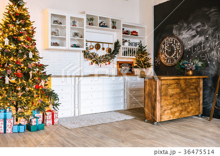 Christmas living room with a Christmas tree, gifts 36475514