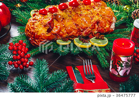 Christmas table dinner time with roasted meats 36475777