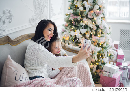 Well-groomed hand of a woman holding a phone Well-groomed hand of a woman holding a phone 36479025