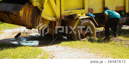 Garbage truck stuck in the mud Garbage truck stuck in the mud 36487672