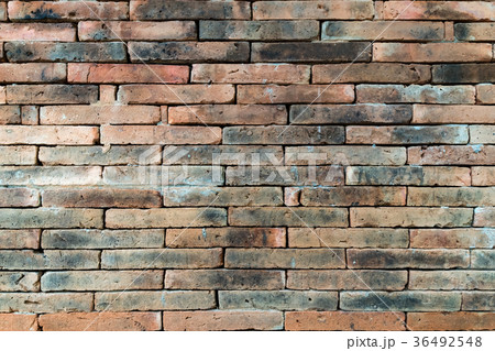 Grunge brown brick wall texture. 36492548