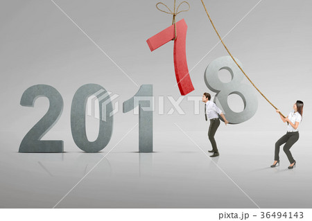 Business team replace number 7 with 8 to fill 2018 36494143