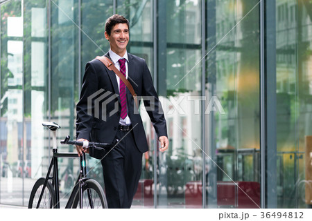Happy active young man walking to the job after Happy active young man walking to the job after 36494812