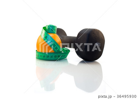 Dumbbell, orange and measuring tape Dumbbell, orange and measuring tape 36495930