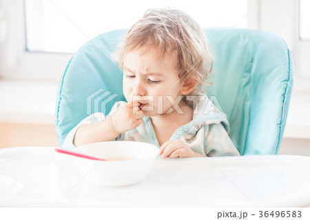 The girl is eating  36496583