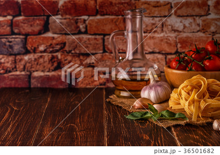 Products for cooking - pasta, tomatoes, garlic 36501682