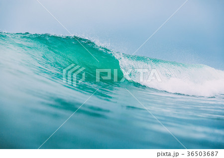 Blue wave in ocean. Crystal wave and cloudy sky Blue wave in ocean. Crystal wave and cloudy sky 36503687