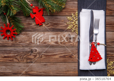 Christmas table place setting with fork and knife Christmas table place setting with fork and knife 36510764