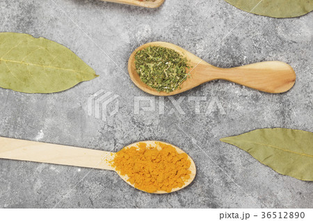 Various spices on a gray background. Top view 36512890