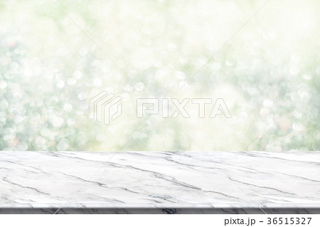 Empty marble table top with green blur christmas Empty marble table top with green blur christmas 36515327