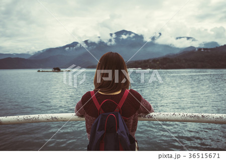 Lonely woman standing absent minded 36515671