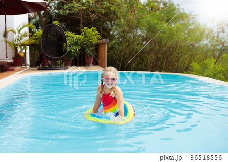 Child in swimming pool. Kids swim. Water play. Child in swimming pool. Kids swim. Water play. 36518556