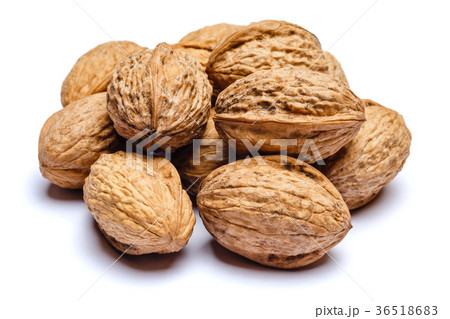 pile of walnuts isolated on white background pile of walnuts isolated on white background 36518683