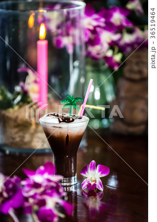 Still life with Iced coffee with cream orchids 36519464