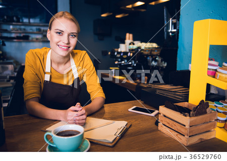 Outgoing worker having job in cafe Outgoing worker having job in cafe 36529760